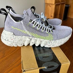 Men’s size 10 Nike Space Hippie athletic shoes.